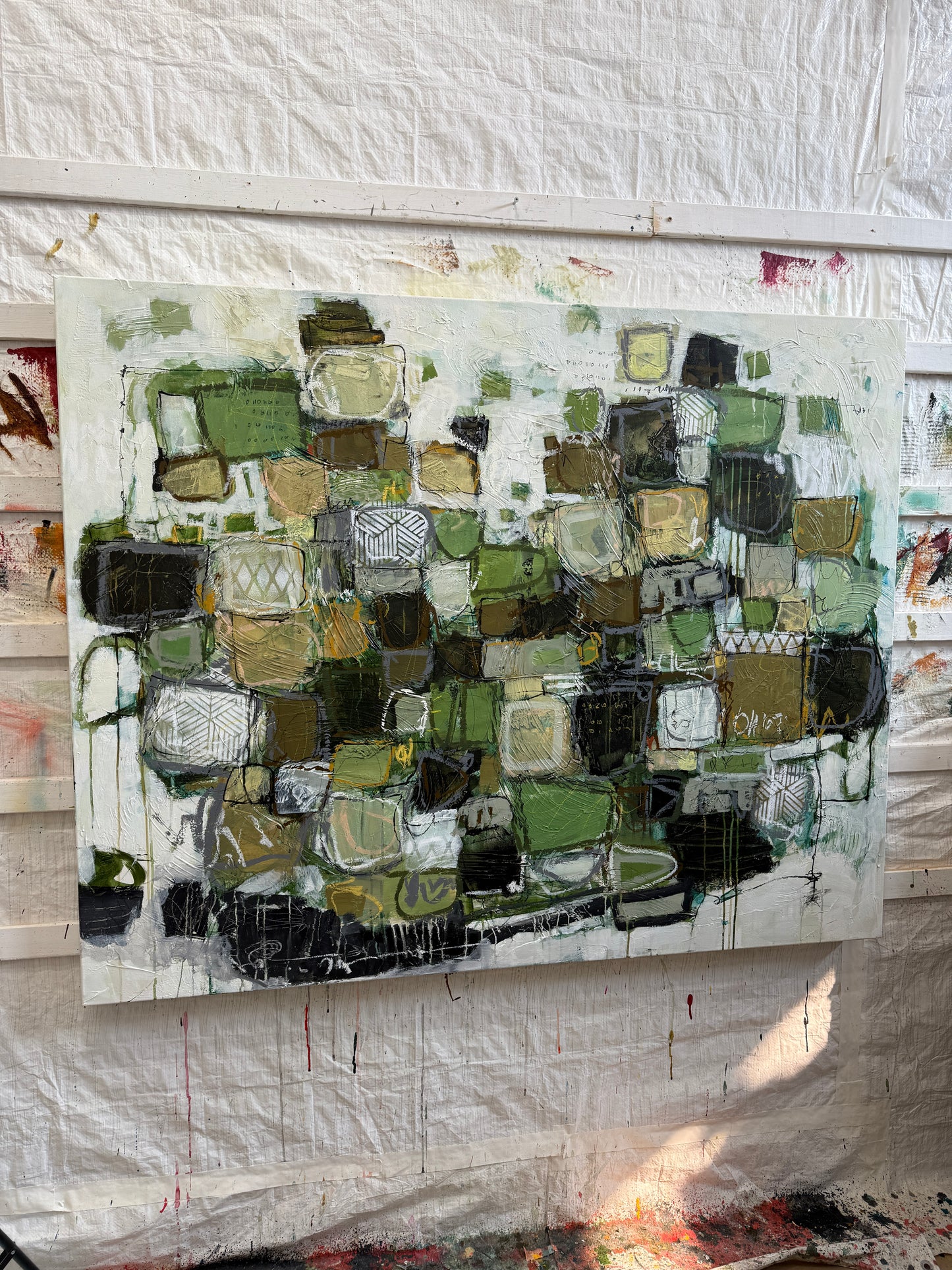 Artistic mosaic piece on a textured surface