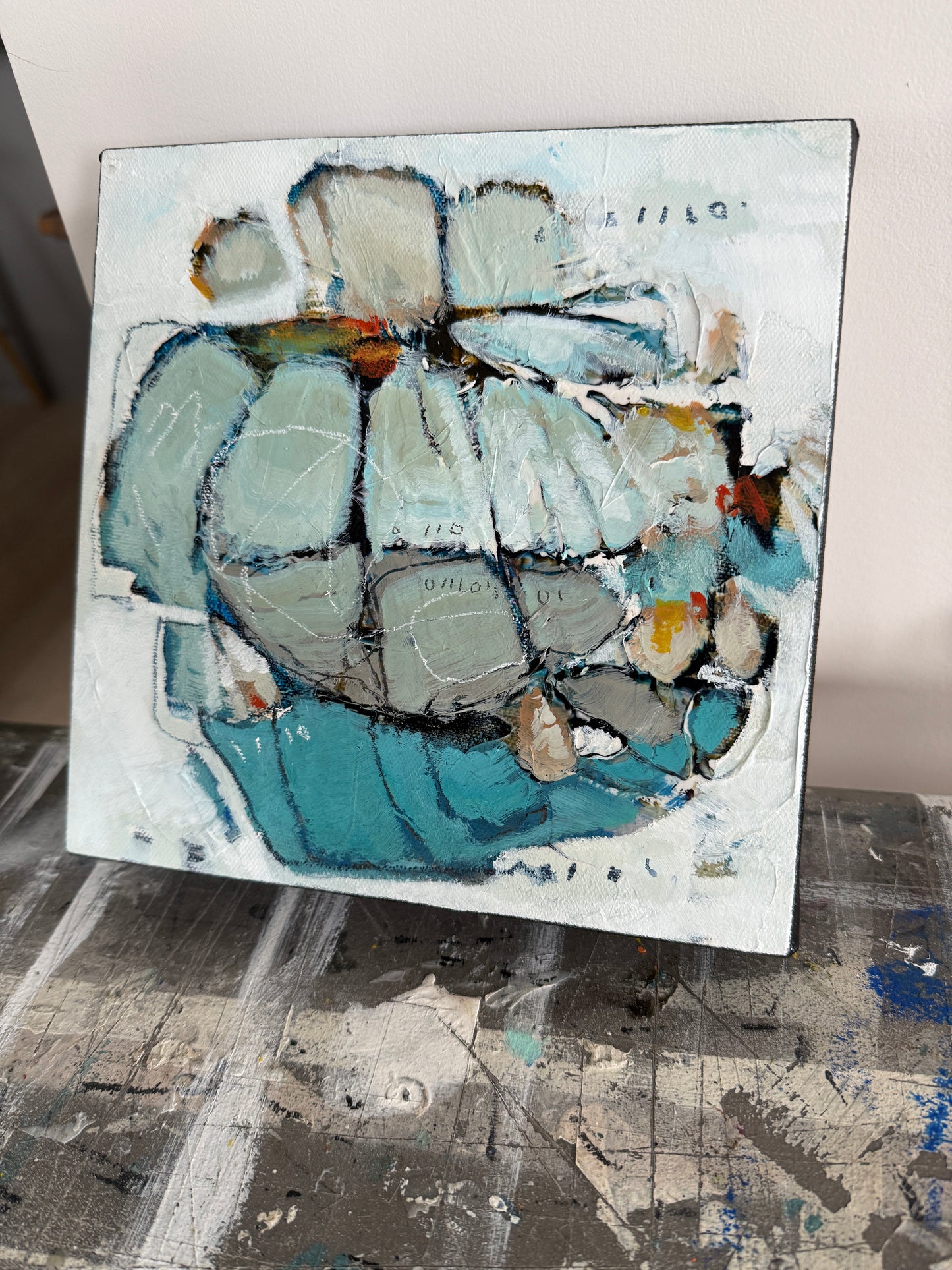 Abstract painting of a flower with blue and gray tones on a white background 8x8 Lori Mirabelli