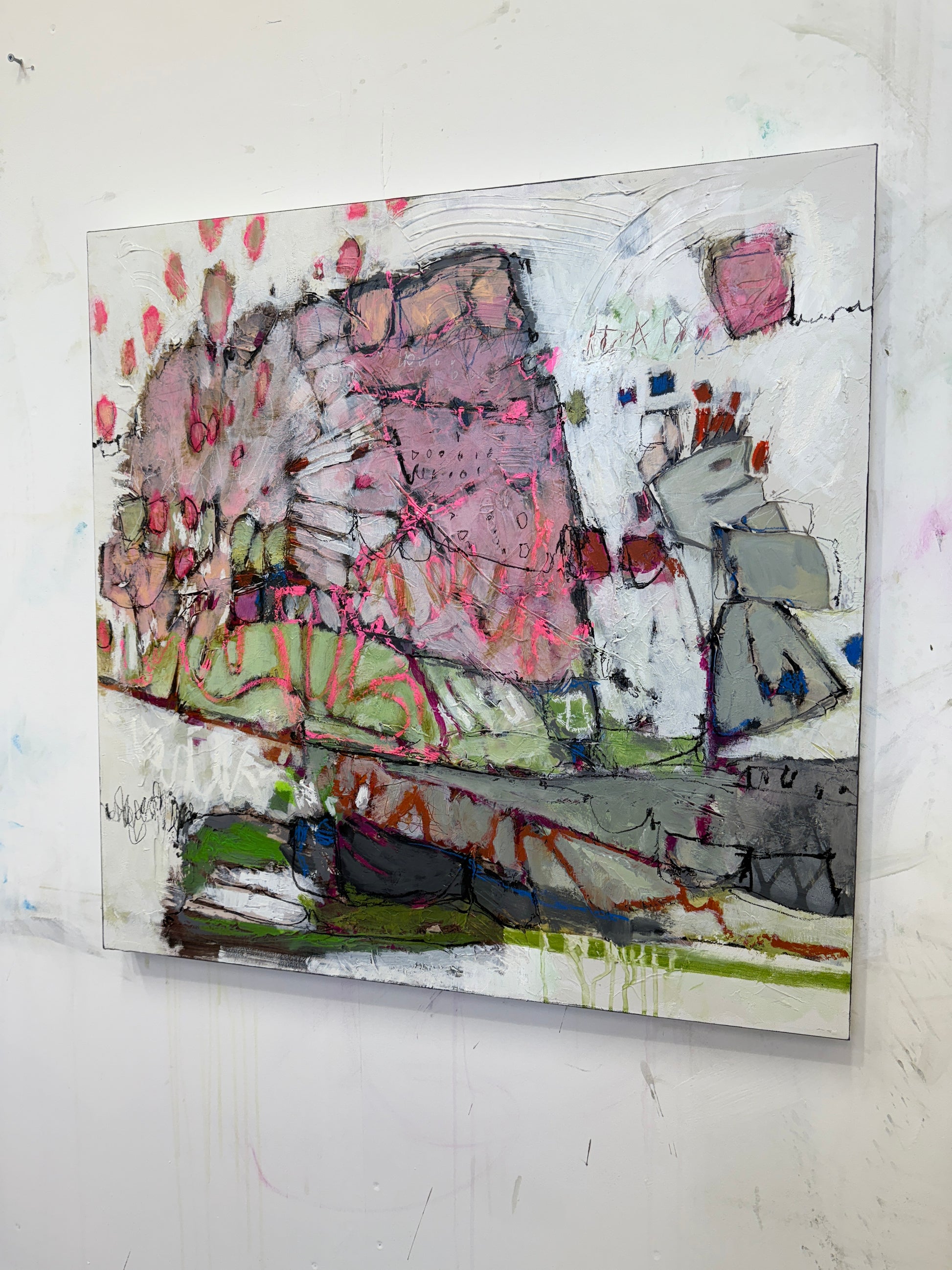 Abstract art piece with pink, green, and gray colors on a white background