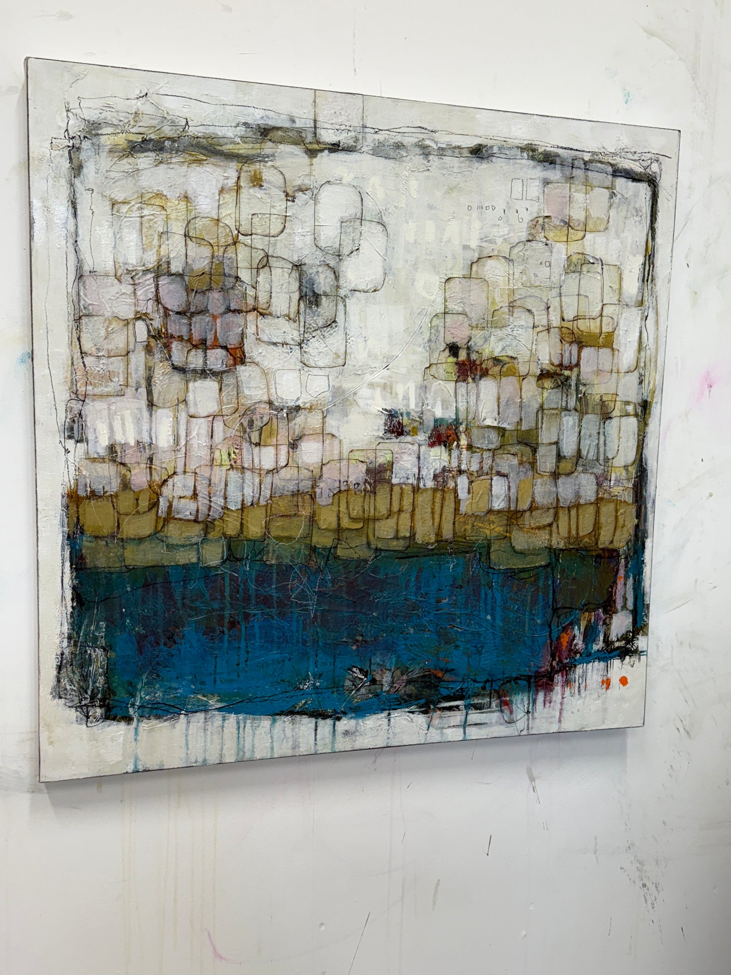 Abstract art piece with textured surface on a white background