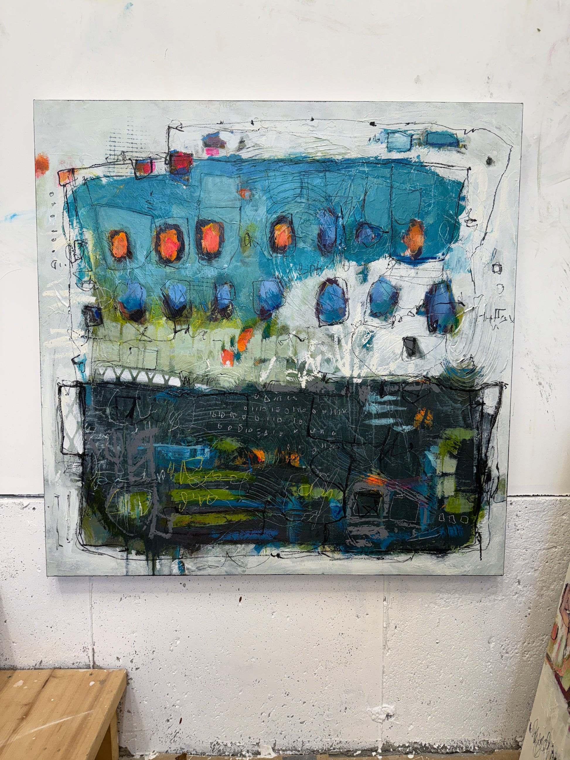 Abstract artwork with a mix of blue, black, and orange colors on a white background lori mirabelli.