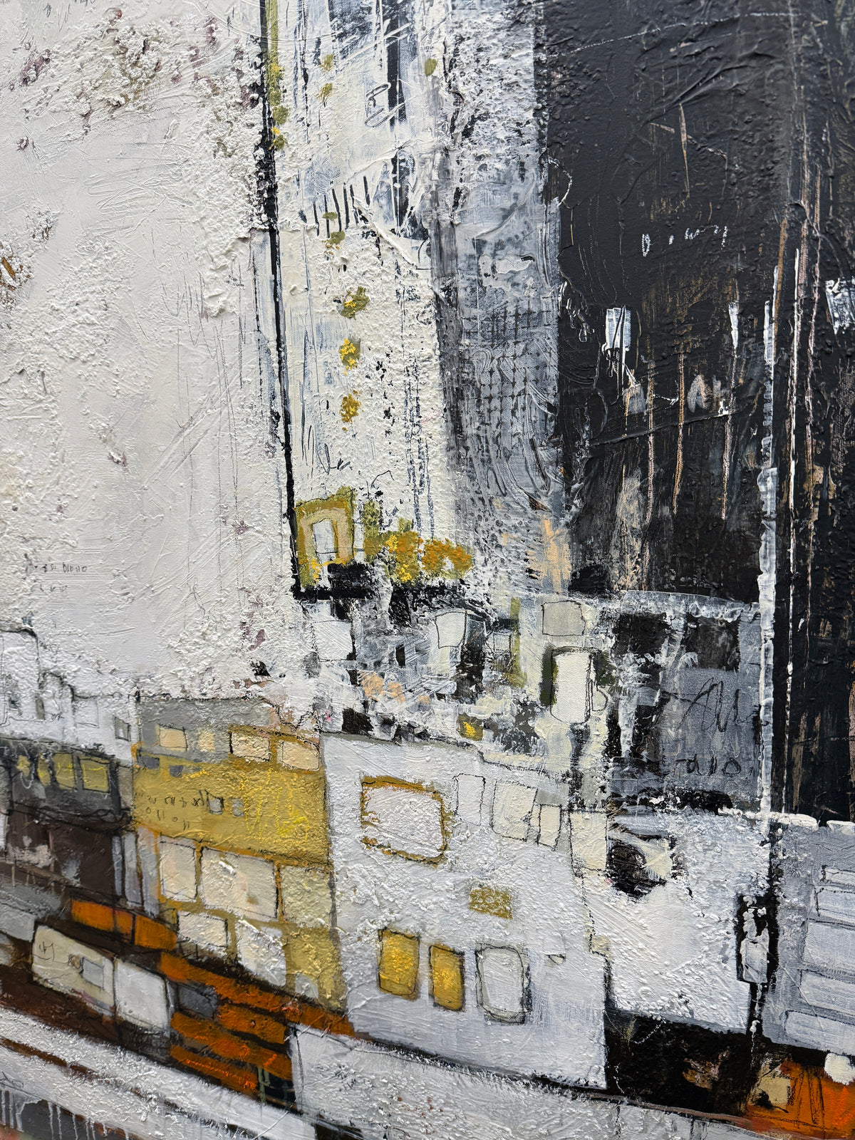 Square abstract painting with a large textured off-white area across the upper left. A charcoal-black section fills the upper right. Along the lower half, layered rectangular shapes and fine marks in grey, white, mustard yellow and rust orange suggest a loose cityscape.
