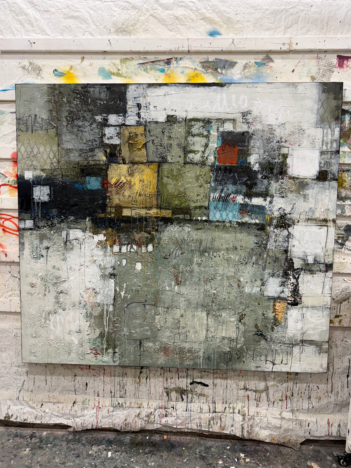 abstract painting, acrylic on canvas, textured surface, geometric composition, large scale, statement piece, earthy palette, olive green, charcoal grey, ochre yellow, turquoise accents, contemporary interiors, Canadian painter, Lori Mirabelli, Ottawa, Toronto, Montreal, Smiths Falls, 54x60