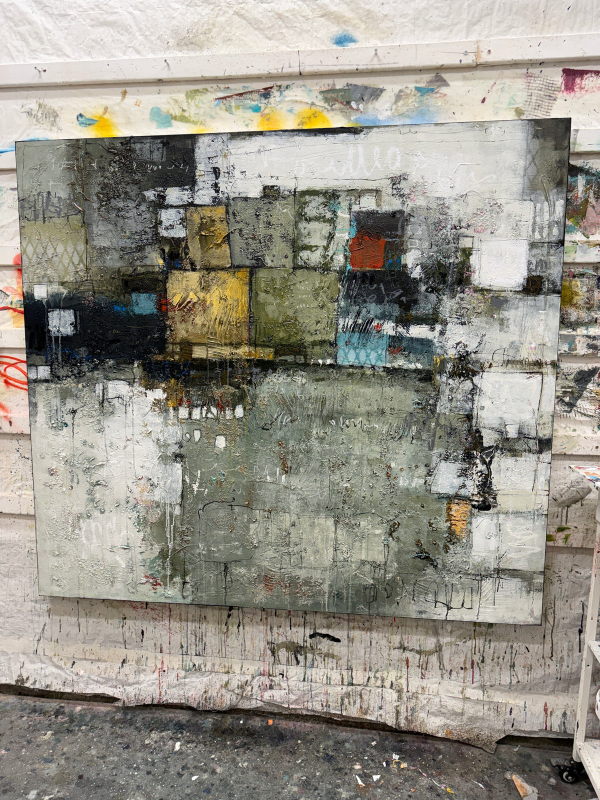 abstract painting, acrylic on canvas, textured surface, geometric composition, large scale, statement piece, earthy palette, olive green, charcoal grey, ochre yellow, turquoise accents, contemporary interiors, Canadian painter, Lori Mirabelli, Ottawa, Toronto, Montreal, Smiths Falls, 54x60