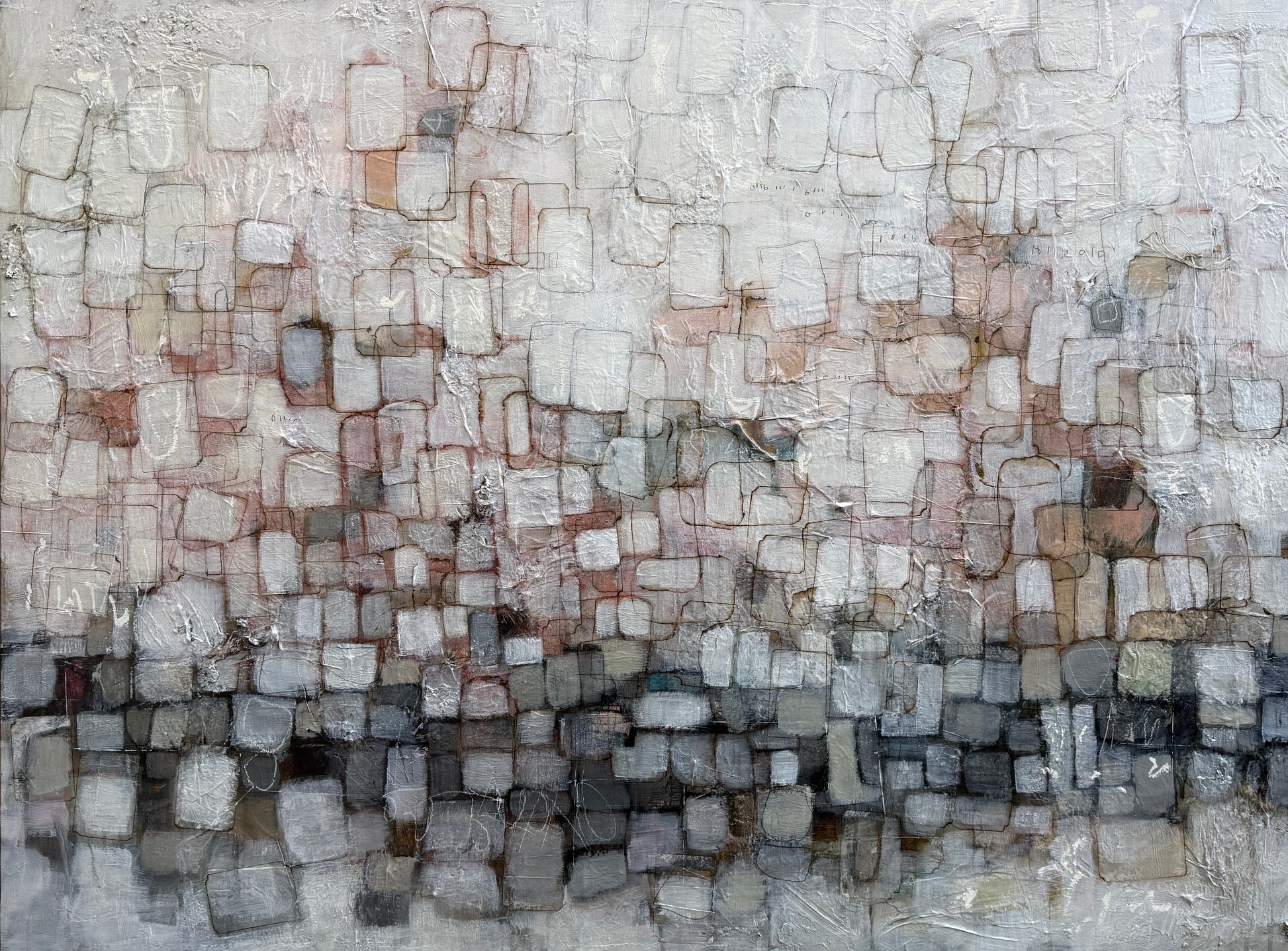 An abstract textured painting featuring a mosaic of square and rectangular blocks in shades of gray, white, beige, and muted terracotta, with a darker band of gray and black at the bottom.