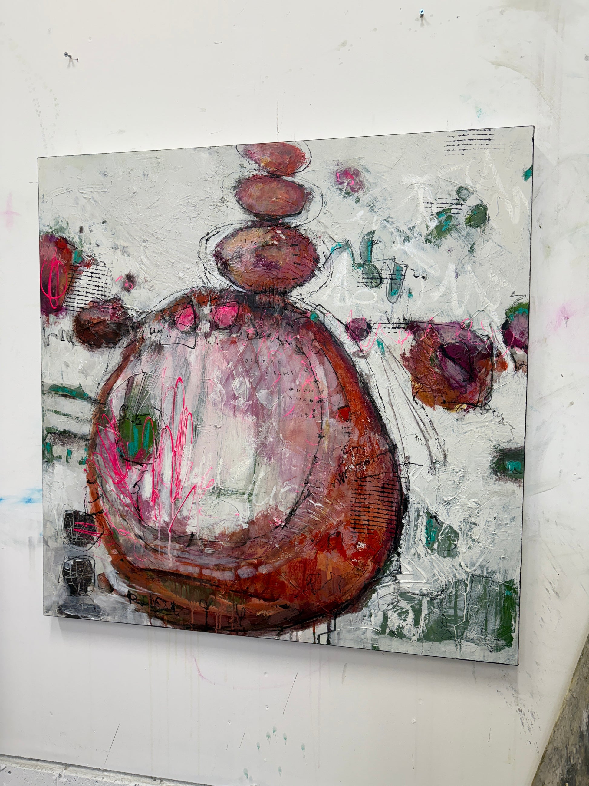 Abstract art piece with circular shapes and textural elements on a white background