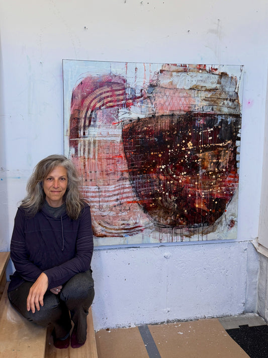 Abstract art piece with a central dark circular shape and layered textures. Lori Mirabelli Toronto 48x48