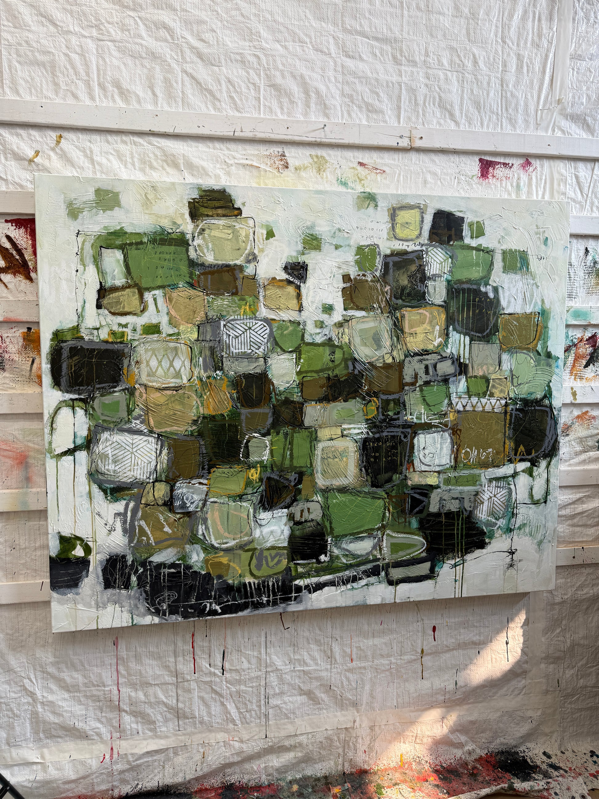 Artistic mosaic piece on a textured surface