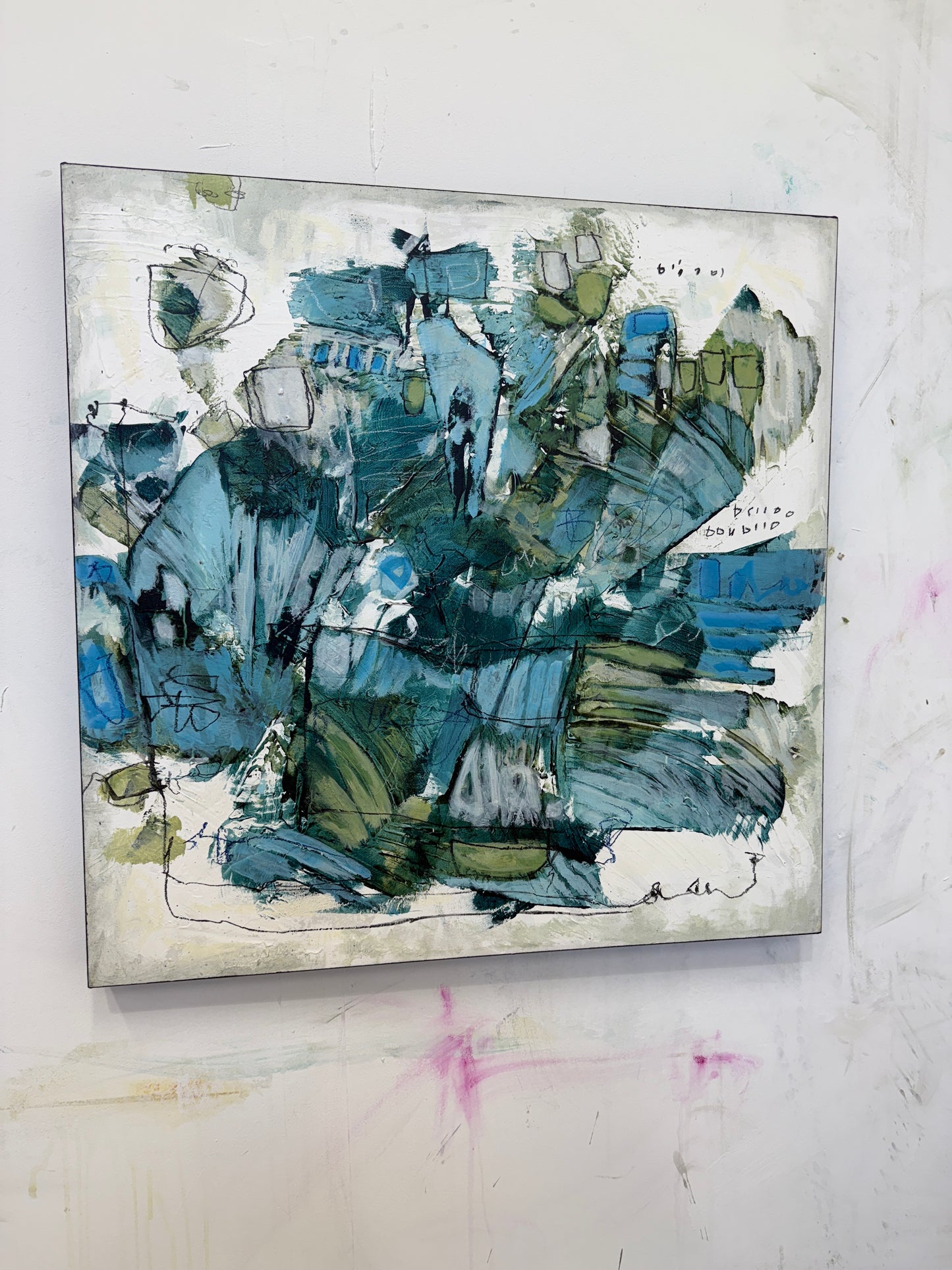 Abstract art piece with blue and green colors on a textured background art by Lori Mirabelli