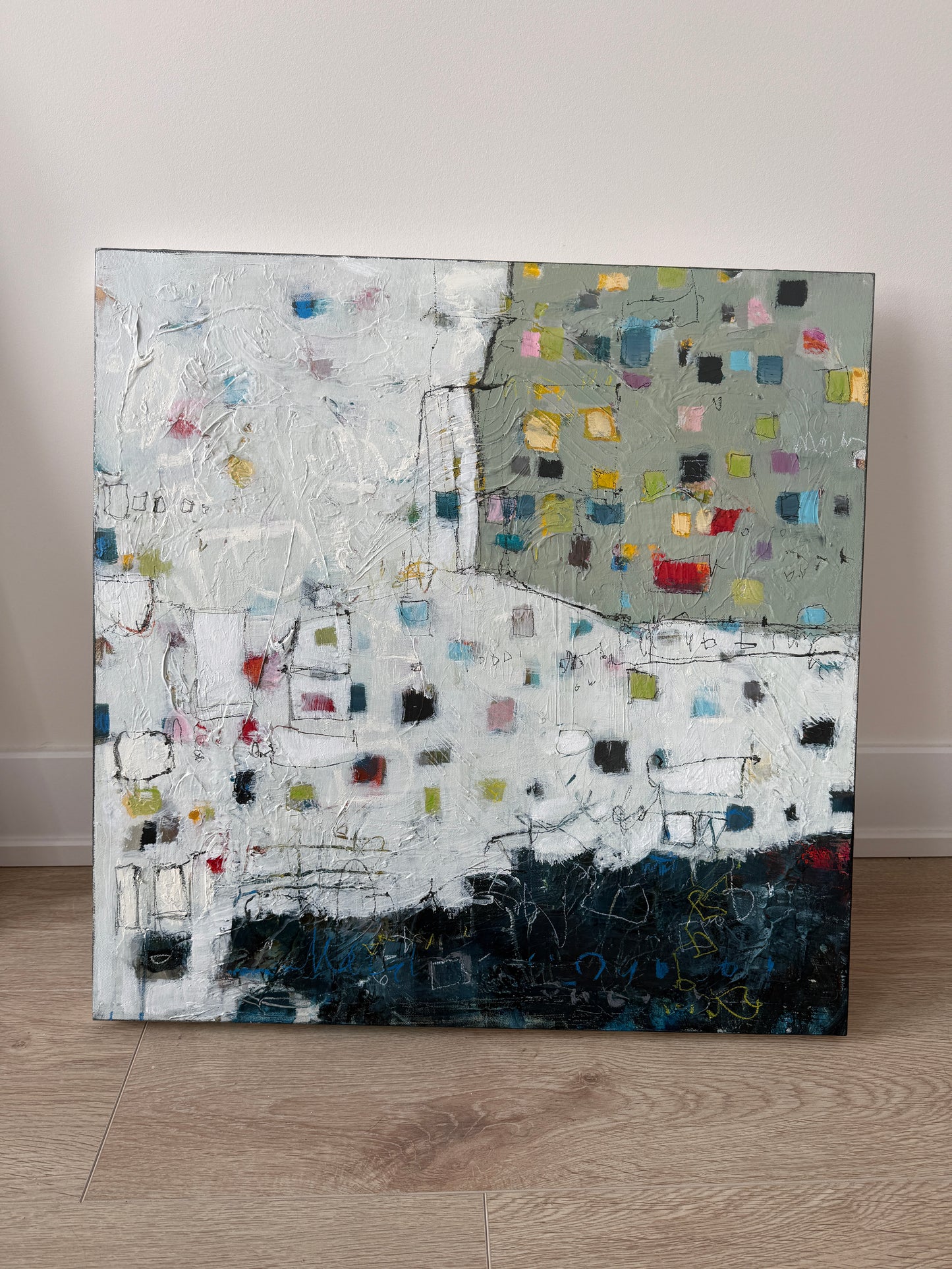 Modern abstract art by Lori Mirabelli 24 x 24 acrylic on canvas with scattered colorful squares and dark grounding base